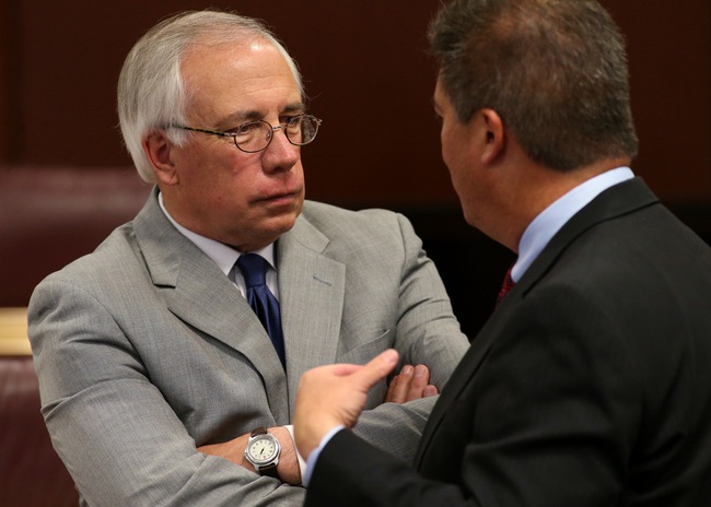 Nevada Assembly Minority Leader Pat Hickey, R-Reno, left, talks with lobbyist Rocky Finseth at the Legislative Building Carson City on Tuesday, May 7, 2013. 