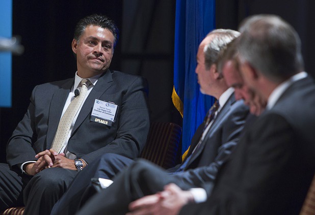 Ramon Torres, left, a Latin Chamber of Commerce board member, listens to a question from moderator Jon Ralston during "Securing America's Future," a conference sponsored by the Latin Chamber of Commerce and the U.S. Global Leadership Coalition, at the Four Seasons Wednesday, May 15, 2013.