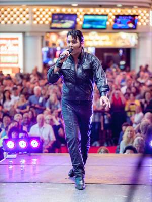 Chad Collins of Las Vegas competes in the second day of the Las Vegas Ultimate Elvis Tribute Artist Contest on Saturday, May 11, 2013. Collins won the competition.