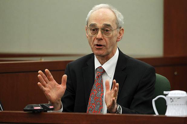 David J. Cook, a collections attorney, testifies at O.J. Simpson's evidentiary hearing in Clark County District Court Thursday, May 16, 2013. Simpson, who is currently serving a nine-to-33-year sentence in state prison as a result of his October 2008 conviction for armed robbery and kidnapping charges, is using a writ of habeas corpus to seek a new trial, claiming he had such bad representation that his conviction should be reversed.