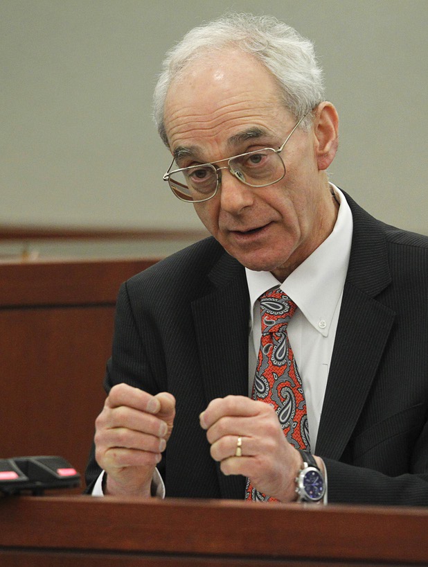 David J. Cook, a collections attorney, testifies at O.J. Simpson's evidentiary hearing in Clark County District Court Thursday, May 16, 2013. Simpson, who is currently serving a nine-to-33-year sentence in state prison as a result of his October 2008 conviction for armed robbery and kidnapping charges, is using a writ of habeas corpus to seek a new trial, claiming he had such bad representation that his conviction should be reversed.