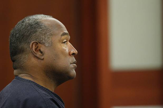 O.J. Simpson listens to testimony at an evidentiary hearing in Clark County District Court Thursday, May 16, 2013. Simpson, who is currently serving a nine-to-33-year sentence in state prison as a result of his October 2008 conviction for armed robbery and kidnapping charges, is using a writ of habeas corpus to seek a new trial, claiming he had such bad representation that his conviction should be reversed.