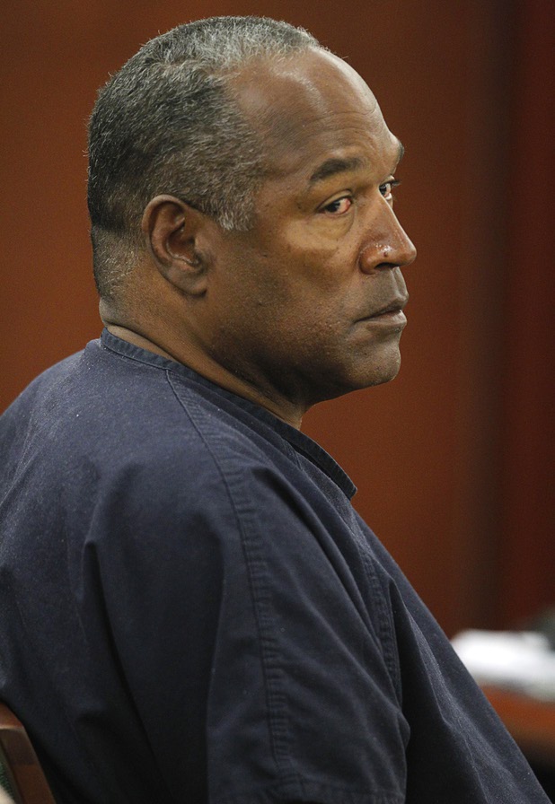 O.J. Simpson listens to testimony at an evidentiary hearing in Clark County District Court Thursday, May 16, 2013. Simpson, who is currently serving a nine-to-33-year sentence in state prison as a result of his October 2008 conviction for armed robbery and kidnapping charges, is using a writ of habeas corpus to seek a new trial, claiming he had such bad representation that his conviction should be reversed.