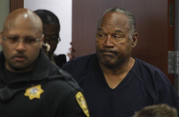 O.J. Simpson arrives for a fifth day of an evidentiary hearing in Clark County District Court Friday, May 17, 2013.. Simpson, who is currently serving a nine-to-33-year sentence in state prison as a result of his October 2008 conviction for armed robbery and kidnapping charges, is using a writ of habeas corpus to seek a new trial, claiming he had such bad representation that his conviction should be reversed.