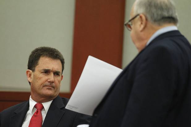Yale Galanter (L), O.J. Simpson's former defense attorney, looks at a document held by lawyer Tom Pitaro during an evidentiary hearing in Clark County District Court Friday, May 17, 2013.. Simpson, who is currently serving a nine-to-33-year sentence in state prison as a result of his October 2008 conviction for armed robbery and kidnapping charges, is using a writ of habeas corpus to seek a new trial, claiming he had such bad representation that his conviction should be reversed.
