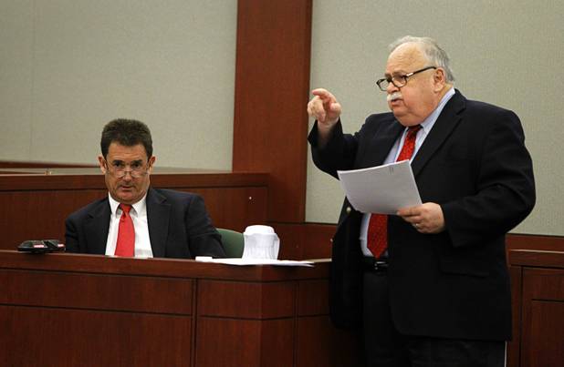 Yale Galanter (L), O.J. Simpson's former defense attorney, listens to Simpson lawyer Tom Pitaro during an evidentiary hearing in Clark County District Court Friday, May 17, 2013.. Simpson, who is currently serving a nine-to-33-year sentence in state prison as a result of his October 2008 conviction for armed robbery and kidnapping charges, is using a writ of habeas corpus to seek a new trial, claiming he had such bad representation that his conviction should be reversed.