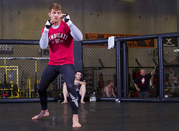 UFC welterweight fighter Mike Pyle shadow boxes at the Syndicate gym Monday, May 20, 2013 in this file photo.