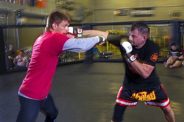 UFC welterweight fighter Mike Pyle, left, spars with Nate Pettit as he prepares for UFC 160 at the Syndicate gym Monday, May 20, 2013. Pyle will fight Rick Story at the MGM Grand Garden Arena Saturday.