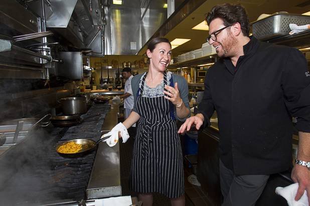 Las Vegas Weekly's Sarah Feldberg and chef Scott Conant make spaghetti in the Scarpetta restaurant kitchen at the Cosmopolitan Wednesday, May 22, 2013.