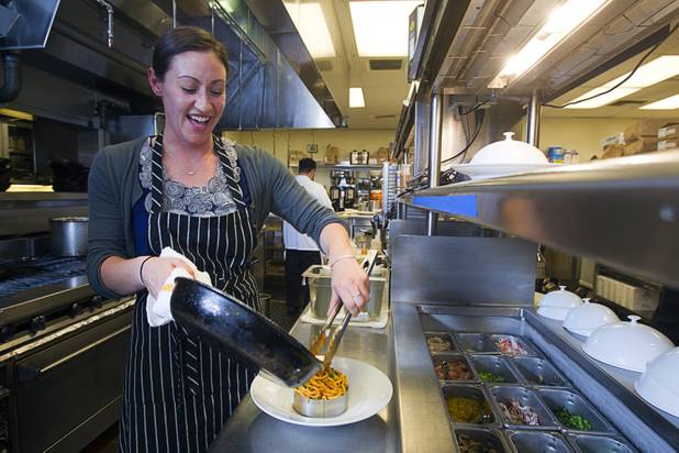 Las Vegas Weekly's Sarah Feldberg makes spaghetti in the Scarpetta restaurant kitchen at the Cosmopolitan Wednesday, May 22, 2013.