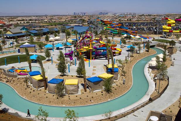 The Colorado Cooler, a 1,000-ft winding waterway, is shown at the Wet 'n' Wild Las Vegas water park, 7055 S. Fort Apache Road, Wednesday, May 22, 2013. Splash Island is shown at center. The new 41-acre park opens to Gold Pass holders on Saturday. Single day tickets are available from June 3.