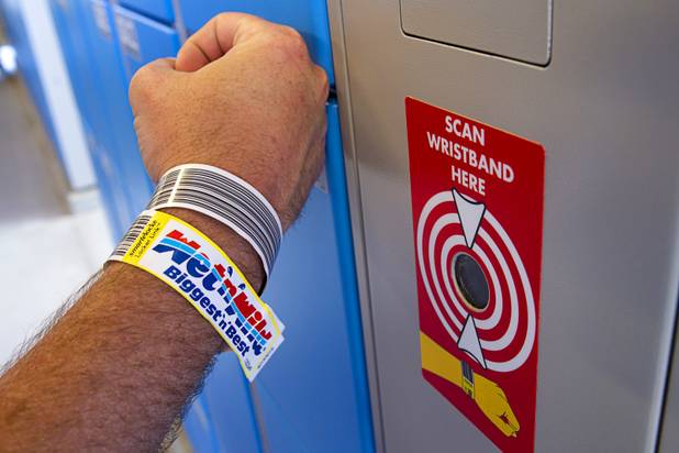 Trevor Wilson models a waterproof wristband with a barcode that provides access to lockers at the Wet 'n' Wild Las Vegas water park, 7055 S. Fort Apache Road, Wednesday, May 22, 2013. The new 41-acre park opens to Gold Pass holders on Saturday. Single day tickets are available from June 3.