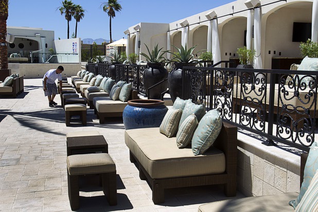 A worker arranges cushions at the Daylight beach club at Mandalay Bay Thursday, May 23, 2013. The new club by the Light Group features a 4,400-square-foot pool, 70 daybeds, 23 cabanas and two bungalows.