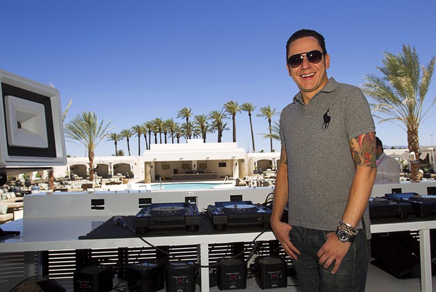 Nick Gold, creative director for the Light Group, poses onstage at the Daylight beach club at Mandalay Bay Thursday, May 23, 2013. The new club by the Light Group features a 4,400-square-foot pool, 70 daybeds, 23 cabanas and two bungalows.