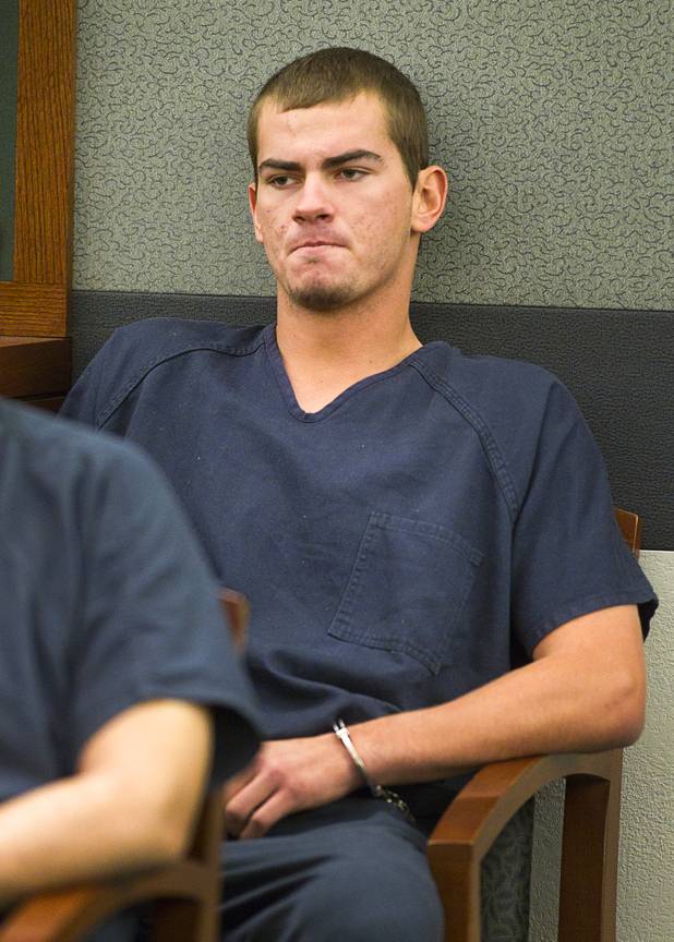 Jacob Dismont, 18, waits for a hearing in Las Vegas Justice Court at the Regional Justice Center Thursday, May 23, 2013. Dismont and Michael Solid, 21, are accused of killing 15-year-old Marcos Arenas while stealing his iPad.
