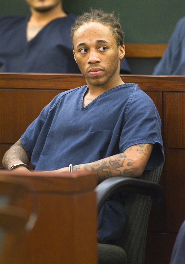 Michael Solid, 21, waits for a hearing in Las Vegas Justice Court at the Regional Justice Center Thursday, May 23, 2013. Solid and Jacob Dismont, 18, are accused of killing 15-year-old Marcos Arenas while stealing his iPad,
