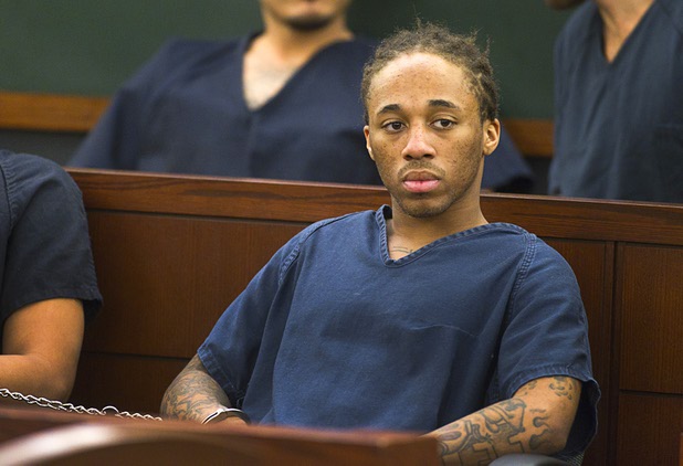 Michael Solid, 21, waits for a hearing in Las Vegas Justice Court at the Regional Justice Center Thursday, May 23, 2013. Solid and Jacob Dismont, 18, are accused of killing 15-year-old Marcos Arenas while stealing his iPad,