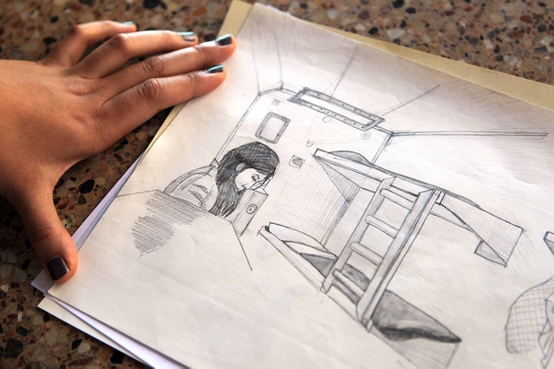Anna Ledesma shows a drawing she made when she was detained. Anna came to United States with her family when she was 7 years old from the Philippines and stayed in the country after the visa tied to her father's work permit expired, eventually graduating from the College of Southern Nevada with a nursing degree.