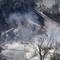 Photo: A fire burns at the site of a CSX freight train de