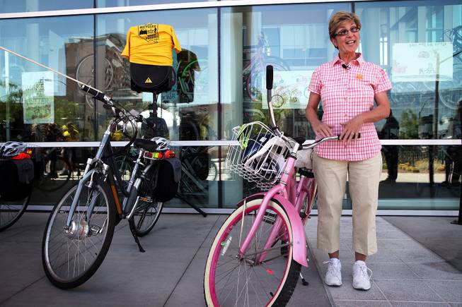 Clark County Commissioner Chris Giunchigliani shows off her pink bike after an educational press conference about safe bicycling on Thursday, May 30, 2013 at the RTC Bonneville Transit Center in downtown Las Vegas.