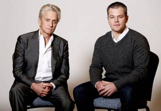 In this Jan. 4, 2013 photo, actors Michael Douglas, left, and Matt Damon, from the HBO film 