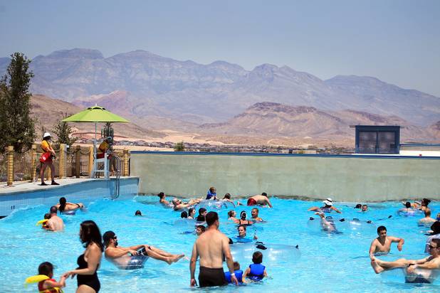 Guests cool off in the Red Rock Bay wave pool during the first day of general admission at Wet'n'Wild Las Vegas on Monday, June 3, 2013.