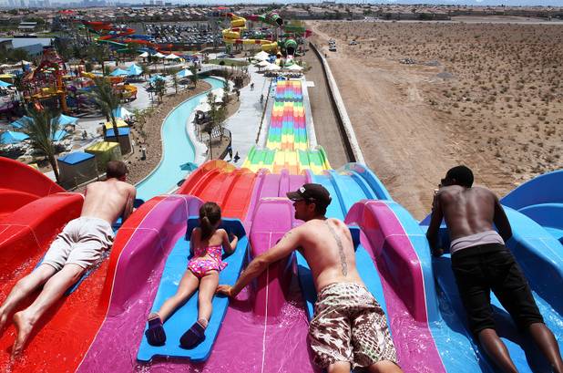 Guests get ready to launch from the top of Desert Racers during the first day of general admission at Wet ’n’ Wild Las Vegas on Monday, June 3, 2013.