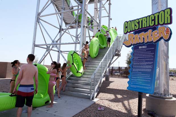 Guests line up for the Rattler and the Constrictor, the most popular rides in the park, during the first day of general admission at Wet'n'Wild Las Vegas on Monday, June 3, 2013.