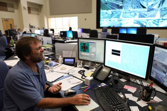 Ken Hutchens, a senior traffic engineering technician at the Freeway & Arterial System of Transportation (FAST) works inside their headquarters in Las Vegas on Thursday, June 6, 2013.