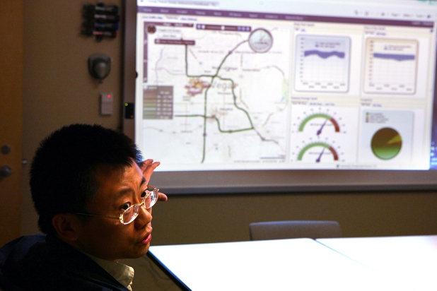 Gang Xie, a project engineer, shows off the software he designed for the Freeway & Arterial System of Transportation (FAST) at their headquarters in Las Vegas on Thursday, June 6, 2013.
