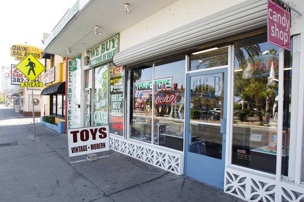 Rogue Toys is seen sandwiched between a pawn shop and candy store on the 600 block of South Las Vegas Boulevard Friday, June 7, 2013.