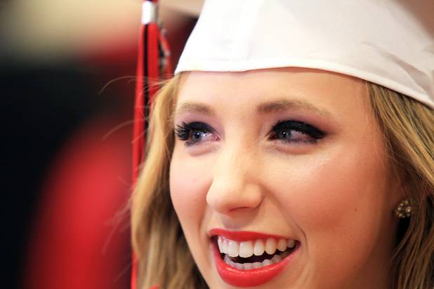 Las Vegas High School valedictorian Natasha Greene attends her commencement ceremony on the school's football field in Las Vegas on Friday, June 7, 2013. Greene has had perfect attendance and perfect grades since kindergarten.