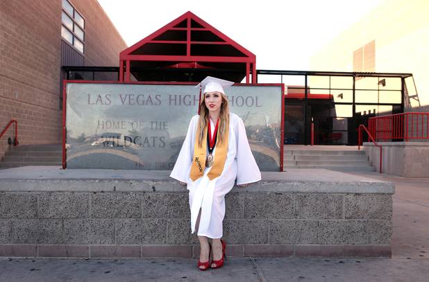 Las Vegas High School valedictorian Natasha Greene attends her commencement ceremony on the school's football field in Las Vegas on Friday, June 7, 2013. Greene has had perfect attendance and perfect grades since kindergarten.
