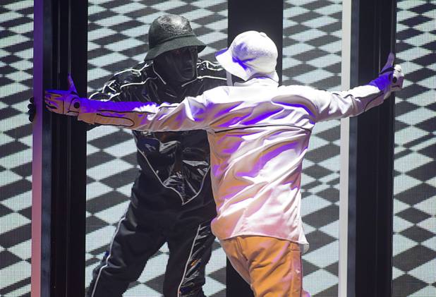 Jabbawockeez cast members perform in "Prism," their new show at the Luxor, Sunday, June 9, 2013.