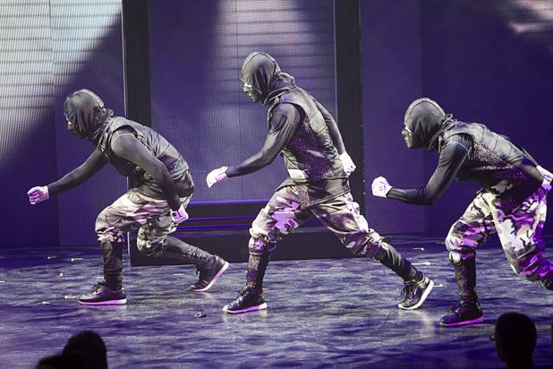 Jabbawockeez cast members perform in "Prism," their new show at the Luxor, Sunday, June 9, 2013.