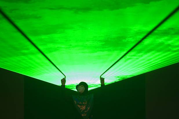 Jabbawockeez cast members perform in "Prism," their new show at the Luxor, Sunday, June 9, 2013.