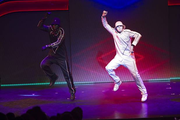 Jabbawockeez cast members perform in "Prism," their new show at the Luxor, Sunday, June 9, 2013.