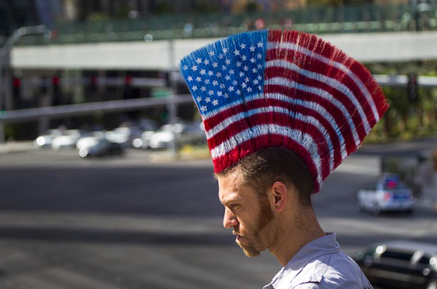 A man sports a cool mohawk while on the Las Vegas Strip Sunday, June 9, 2013. Sunday's high temperature was 109, two degrees shy of the record.