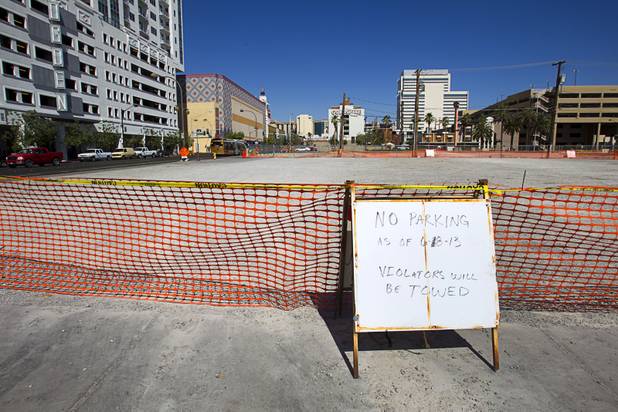 A vacant lot is shown at Ogden Avenue and Sixth Street in downtown Las Vegas Monday, June 10, 2013. The lot, owned by Alonzo Williams Sr., a 62-year-old medical doctor from Little Rock, Ark., was being used for parking but has recently been fenced off.
