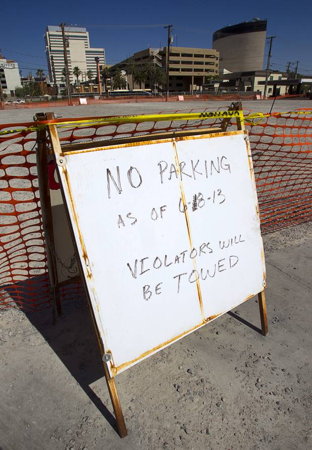 A vacant lot is shown at Ogden Avenue and Sixth Street in downtown Las Vegas Monday, June 10, 2013. The lot, owned by Alonzo Williams Sr., a 62-year-old medical doctor from Little Rock, Ark., was being used for parking but has recently been fenced off.