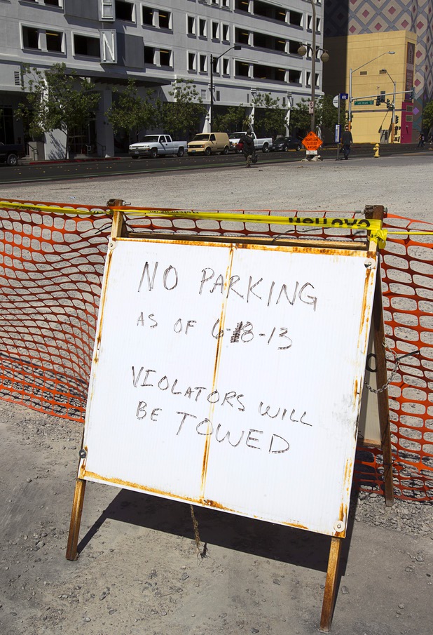 A vacant lot is shown at Ogden Avenue and Sixth Street in downtown Las Vegas Monday, June 10, 2013. The lot, owned by Alonzo Williams Sr., a 62-year-old medical doctor from Little Rock, Ark., was being used for parking but has recently been fenced off.