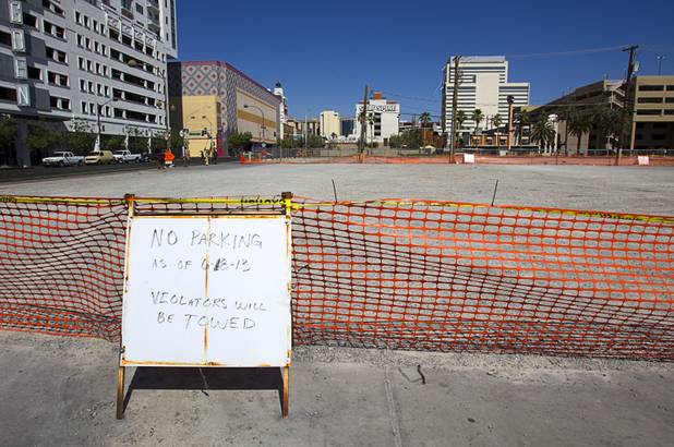 A vacant lot is shown at Ogden Avenue and Sixth Street in downtown Las Vegas Monday, June 10, 2013. The lot, owned by Alonzo Williams Sr., a 62-year-old medical doctor from Little Rock, Ark., was being used for parking but has recently been fenced off.