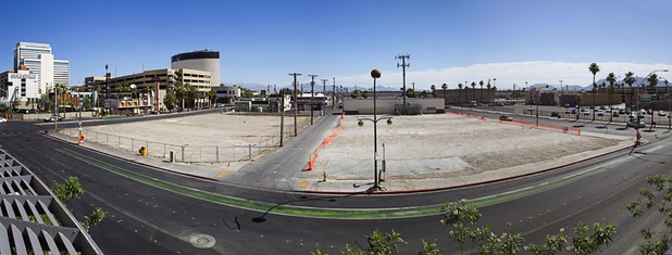 A vacant lots are shown at Ogden Avenue between Las Vegas Boulevard and Sixth Street in downtown Las Vegas Monday, June 10, 2013. The lot at right, owned by Alonzo Williams Sr., a 62-year-old medical doctor from Little Rock, Ark., was being used for parking but has recently been fenced off. The lot at left is owned by Downtown Project investors.