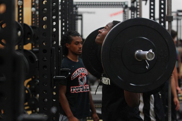 Seitu Wyche uses new weight equipment at Chaparral courtesy of an anonymous donor Tuesday, June 11, 2013.