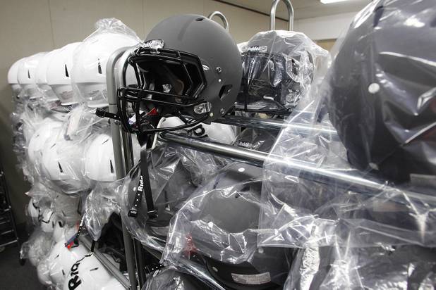 New helmets sit on racks at Chaparral courtesy of an anonymous donor Tuesday, June 11, 2013.