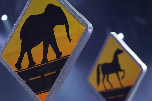 Signs signaling elephant and horse crossings are displayed during the opening night of the Ringling Bros. and Barnum & Bailey Circus at the Thomas & Mack Center Thursday, June 13, 2013. The "Built to Amaze!" tour runs through Sunday, June 16.