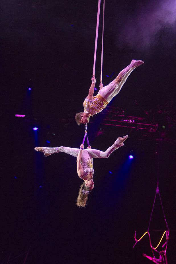 "Iron Jaw" Dima Dolgikh of Russia holds his wife Nadia with his teeth during the opening night of the Ringling Bros. and Barnum & Bailey Circus at the Thomas & Mack Center Thursday, June 13, 2013. The "Built to Amaze!" tour runs through Sunday, June 16.