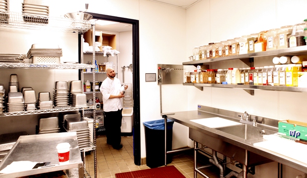 Beverage chef Aaron Bryan locates ingredients inside the Mixology Kitchen at the Cosmopolitan in Las Vegas on Thursday, June 13, 2013.