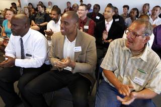 Graduates applaud during the Hope for Prisoners graduation ceremony in Las Vegas on Friday, June 14, 2013. Hope for Prisoners provides intensive one week training for prisoners reentering society.