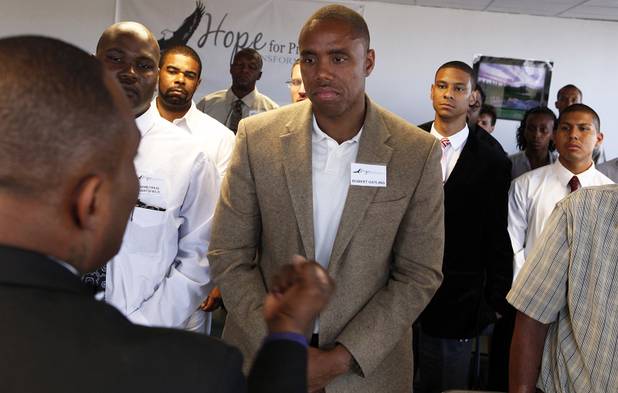 Graduates listen as CEO Jon Ponder speaks during the Hope for Prisoners graduation ceremony in Las Vegas on Friday, June 14, 2013. Hope for Prisoners provides intensive one week training for prisoners reentering society.